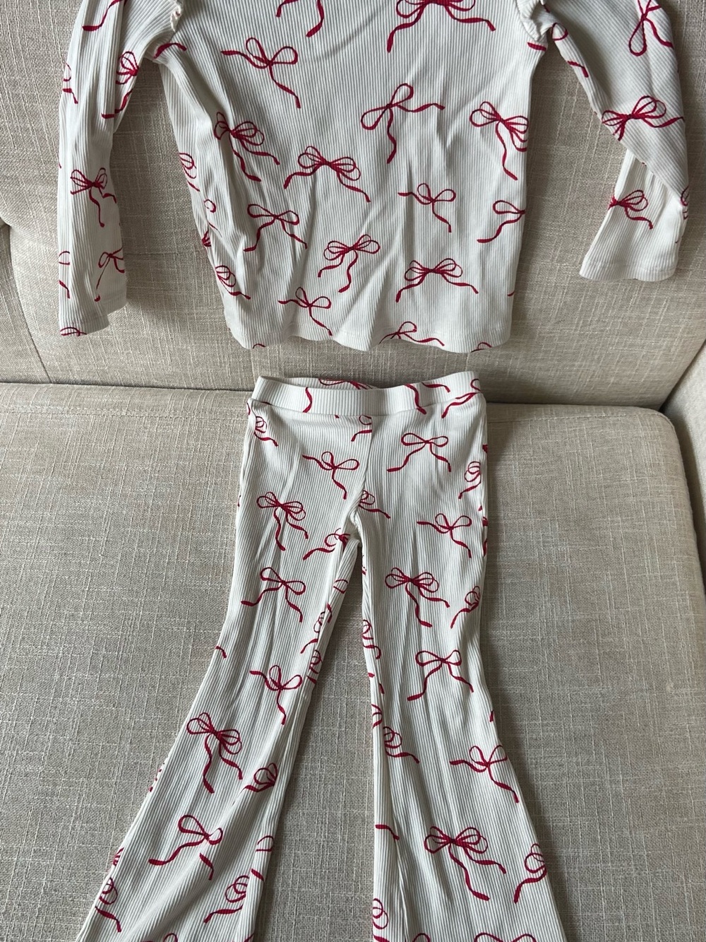Girls’ Cream Long-Sleeve Lounge Set with Red Bow Print and Flare Pants